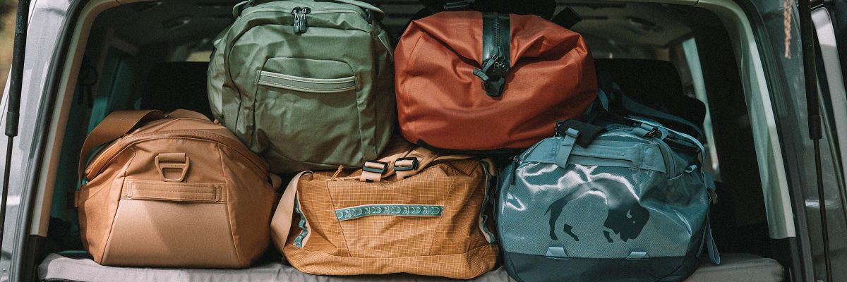 Duffle Bag Test Vergleich Reisetaschen im Kofferraum