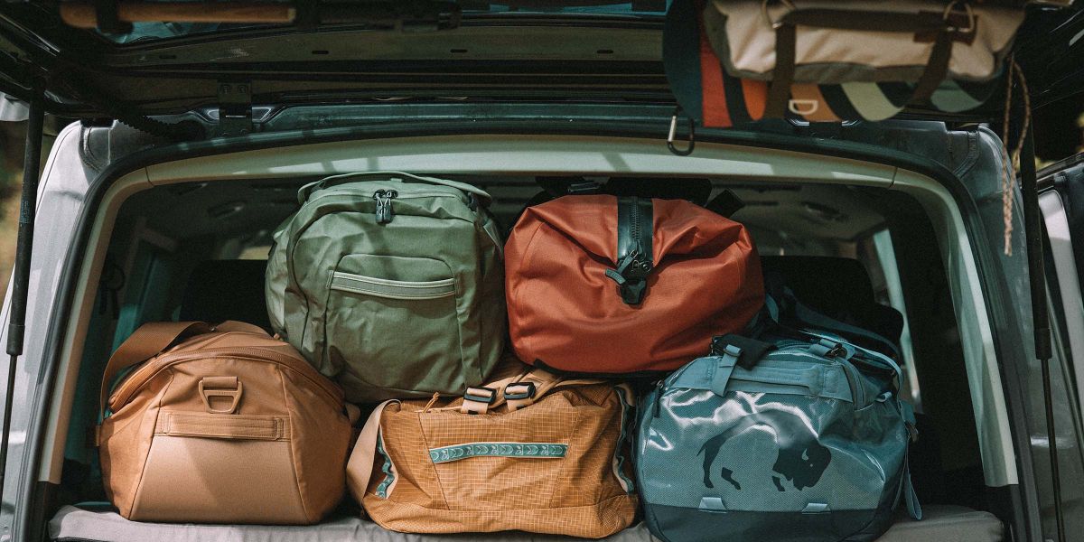 Duffle Bag Test Vergleich Reisetaschen im Kofferraum