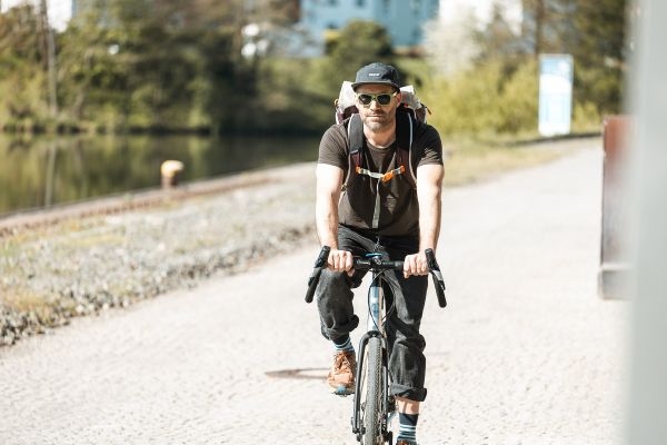 Osprey Transporter Person auf Gravelbike