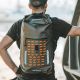 Tatonka Commuter Rolltop 30 WP Rueckenansicht mit Person 64d3df6c